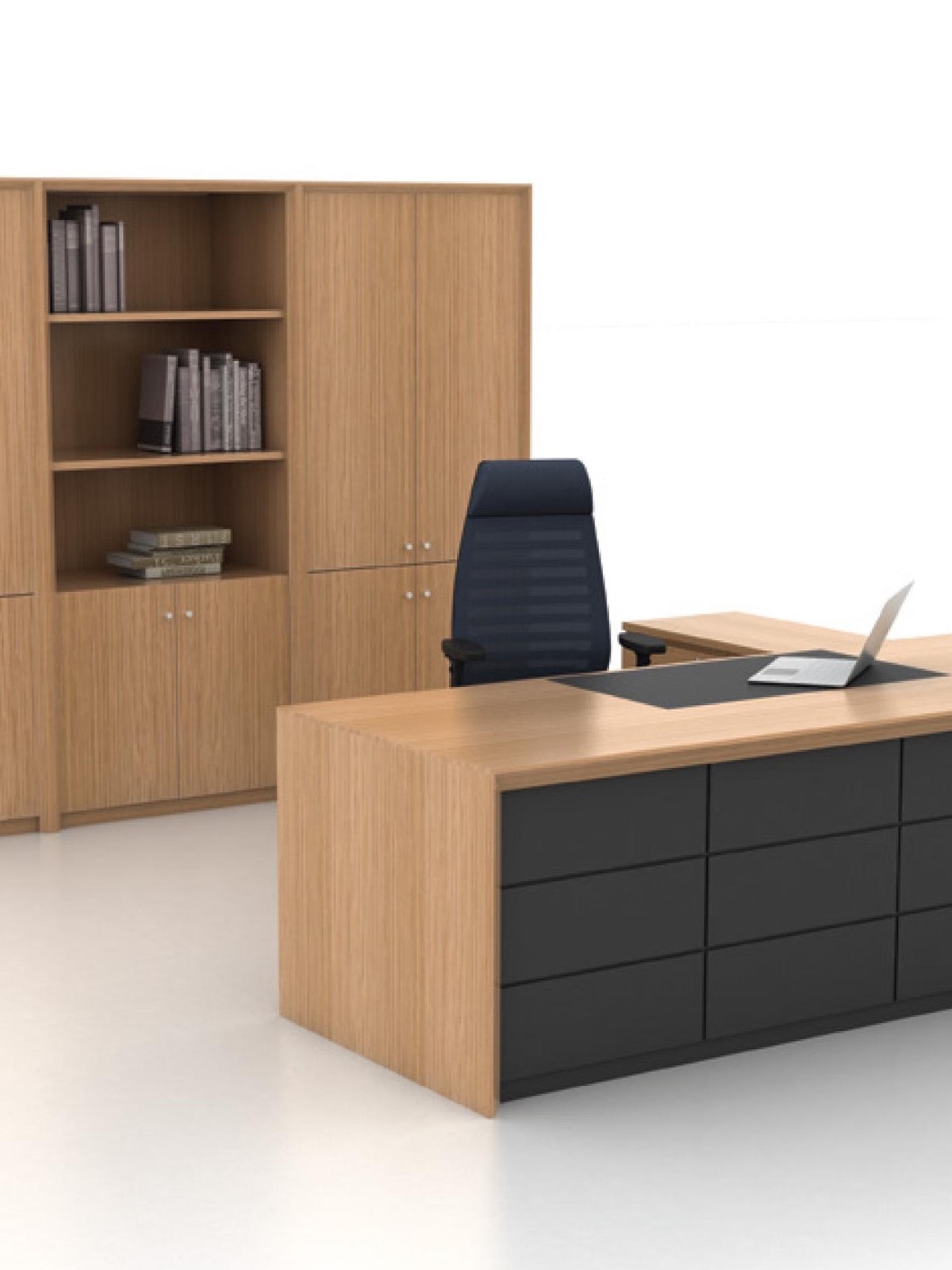 Executive desk and matching bookcase in a bright office