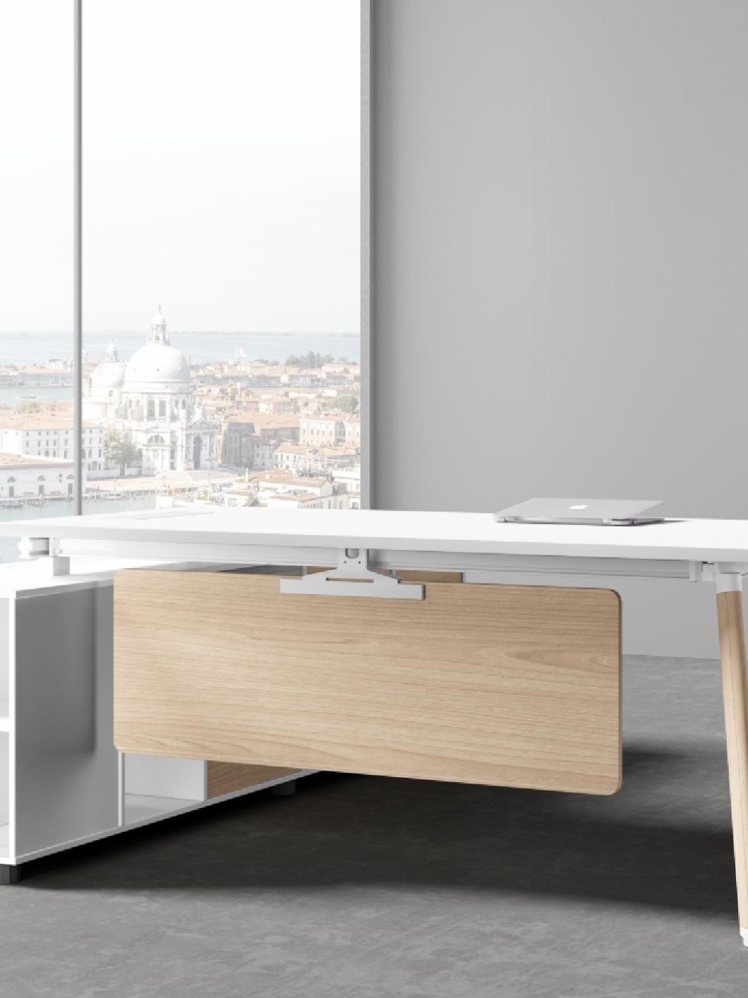 White executive desk beside a floor-to-ceiling city window