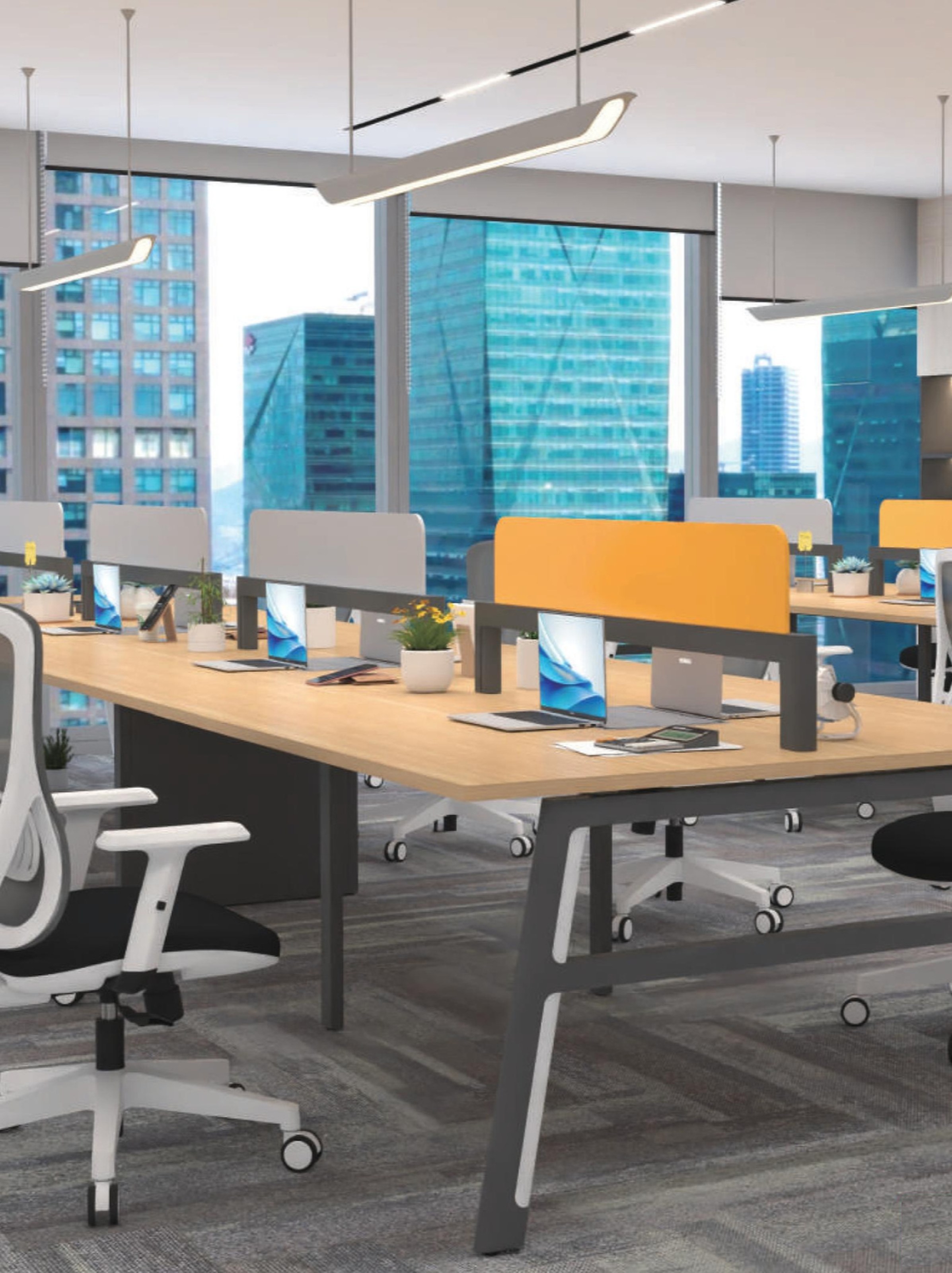 Benched workstation clusters with an orange divider overlooking a cityscape